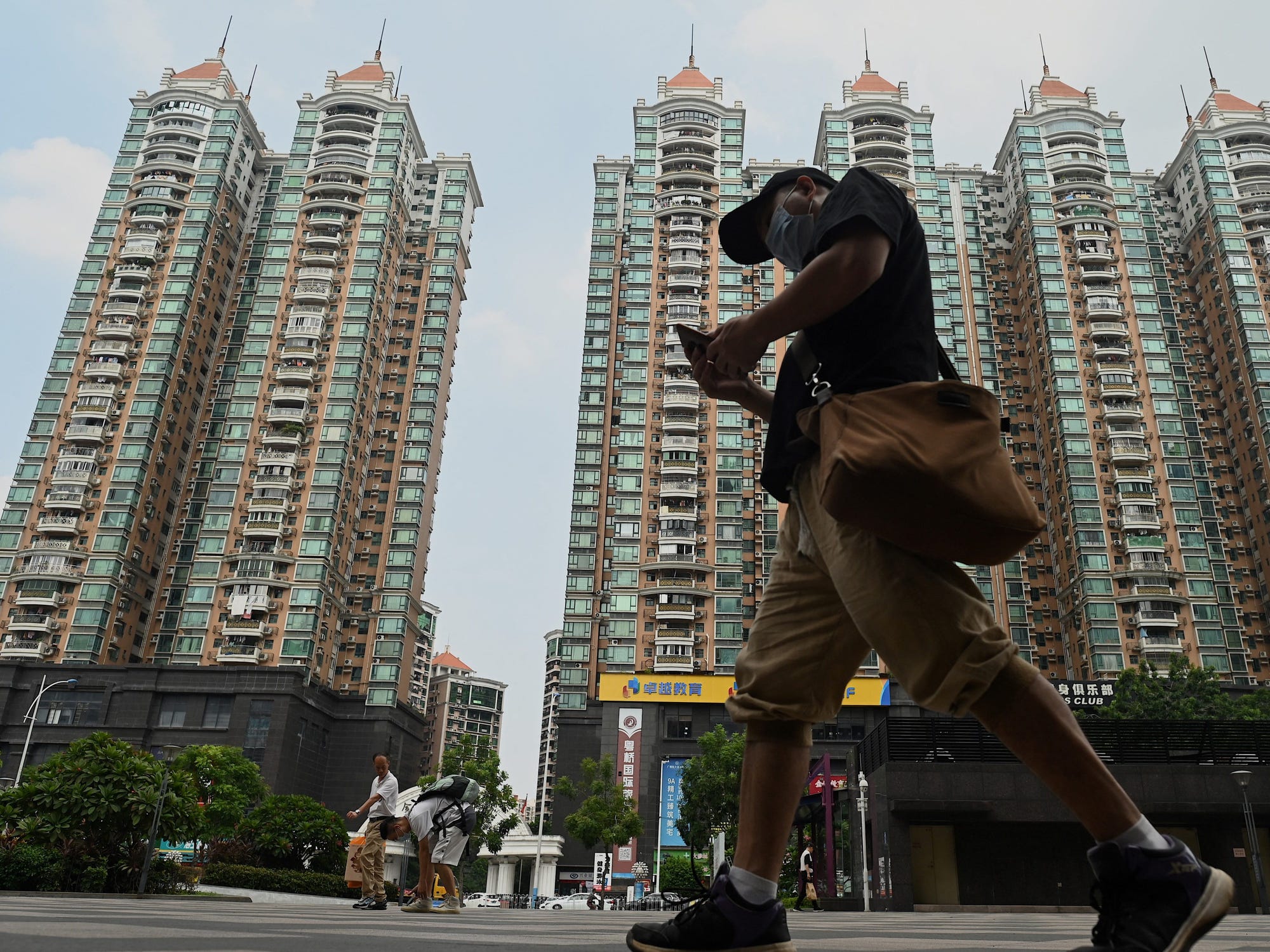 6 photos and stats that put into perspective the sheer size of Evergrande, China's dying real-estate giant that has $300 billion in debt