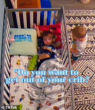 Little kids caught teaching brother how to climb out of crib to play