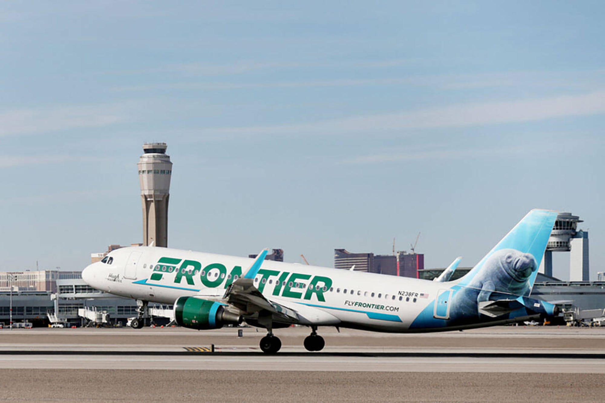 A Frontier Airlines passenger pulled down her pants and squatted in the aisle when she wasn't allowed to use the bathroom during landing, affidavit says