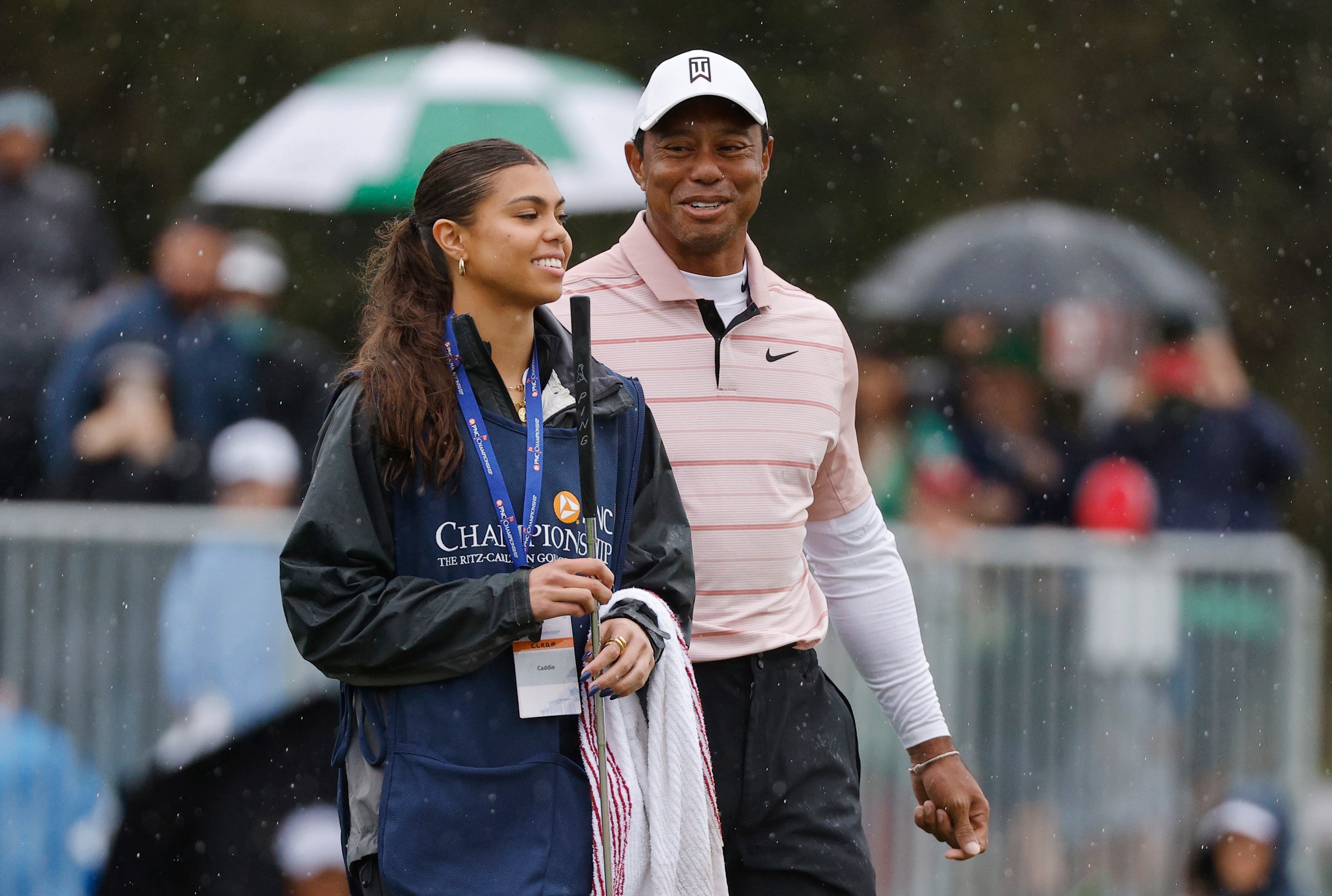 Tiger Woods beams as he watches daughter Sam, 17, play in semi-final of high school football tournament...