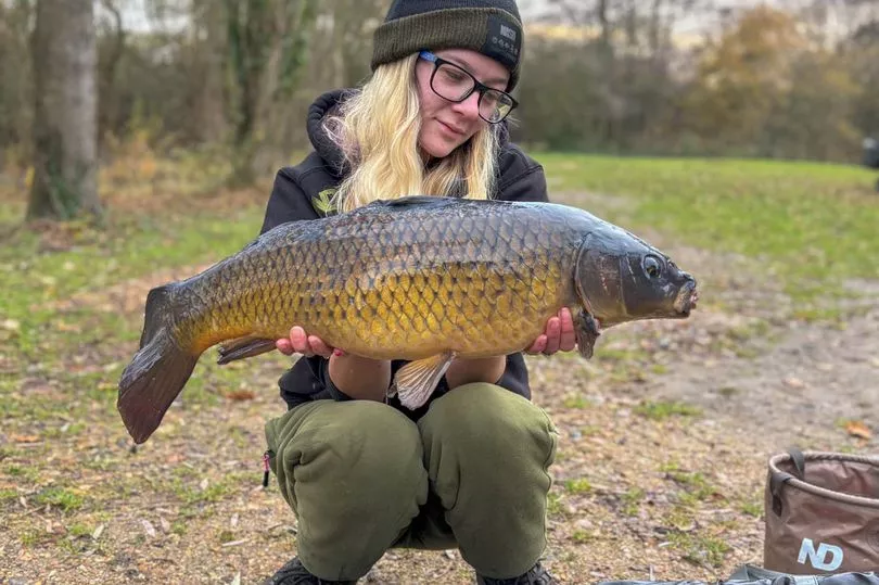 Record-breaking 8ft fish caught by husband and wife so big it ruined a Chinese