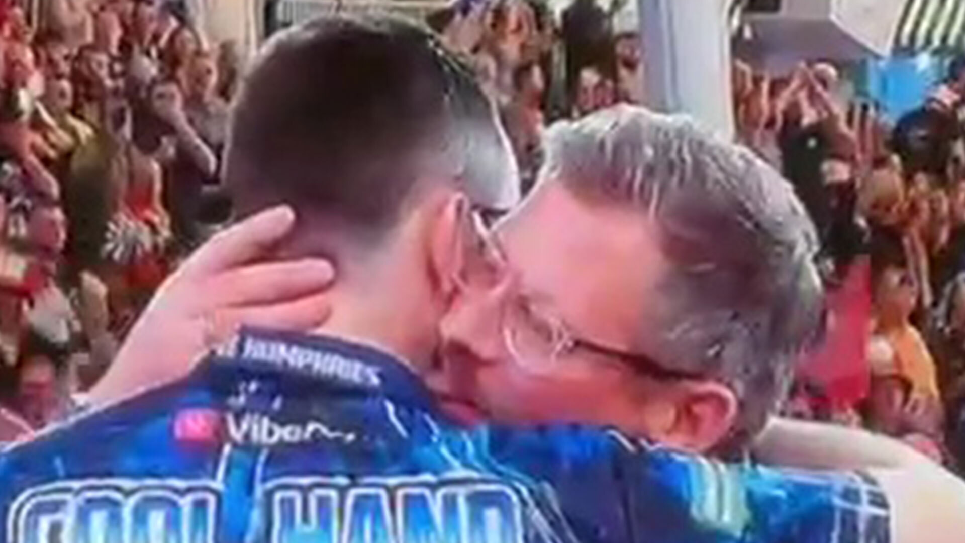 Eagle-eyed fans spot bizarre moment James Wade LICKS Luke Humphries’ neck at UK Open...