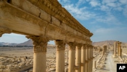 Experts push to restore Syria's war-torn heritage sites, including Roman ruins at Palmyra