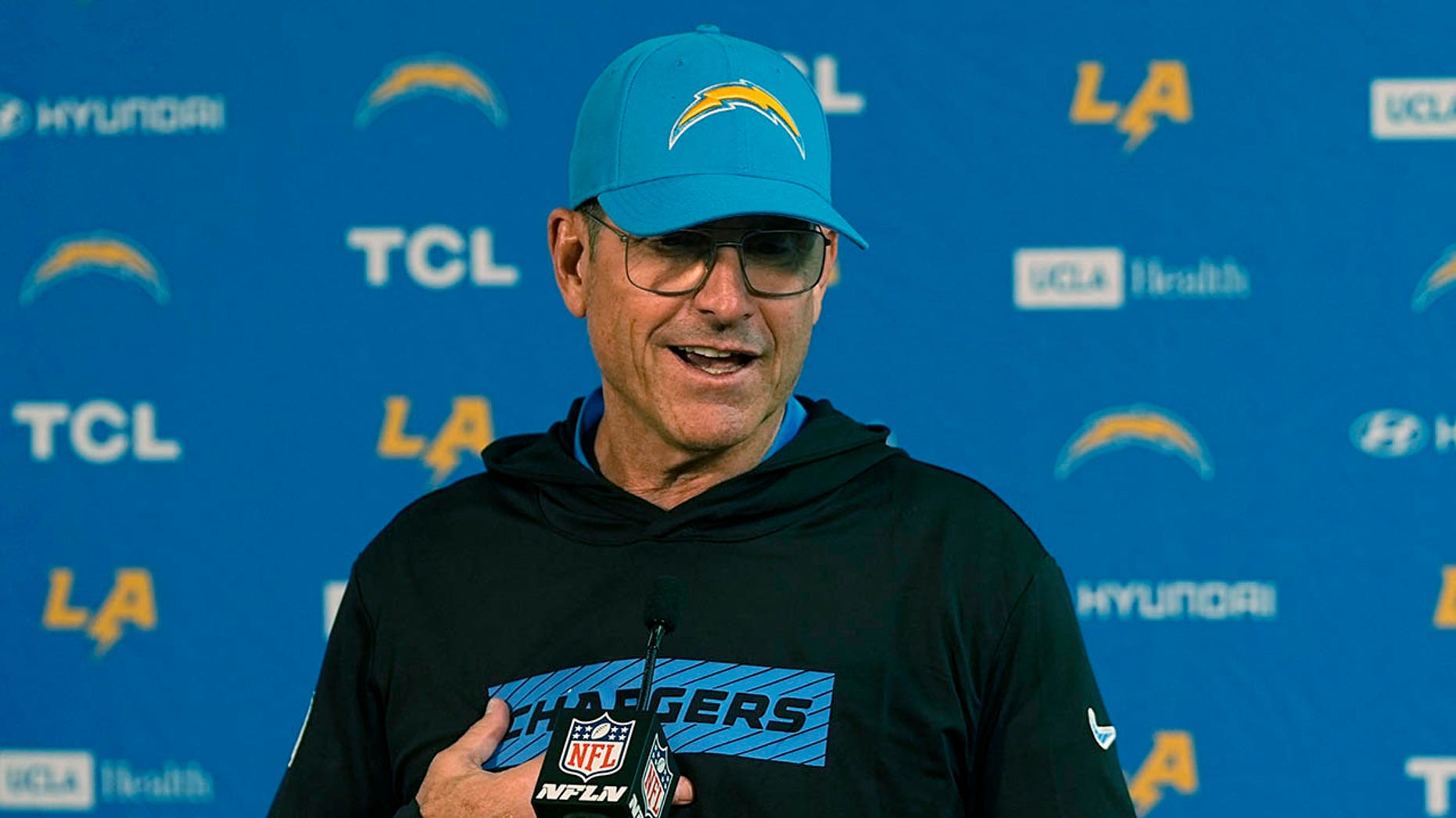 Chargers' Jim Harbaugh loves seeing NFL stars being open about their faith: 'It's inspiring'