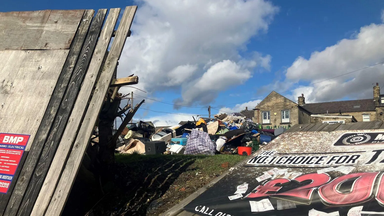 Bradford: Mound of fly-tipped waste dumped next to main road