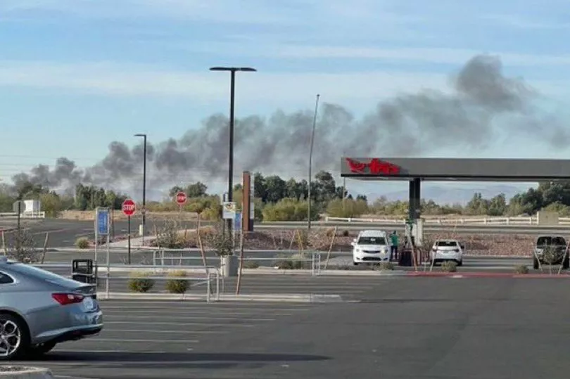 Plane erupts into huge plume of smoke after deadly two-jet crash at airport