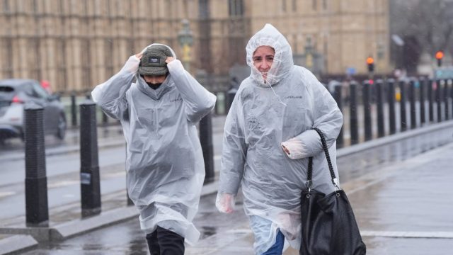 UK to be battered by 70mph winds and heavy rain as weather warnings issued