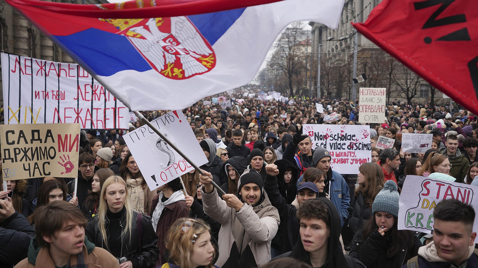 Driver rams car into protesters as Serbian students lead strike