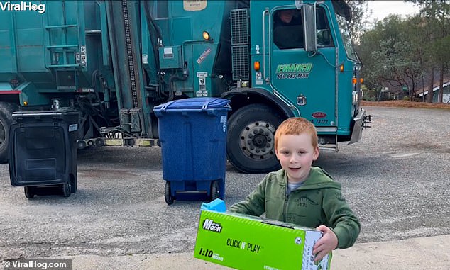 Garbage collector gives his biggest fan, aged four, his own toy truck