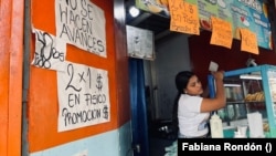 Venezuelan merchants navigate gap between official, parallel dollar