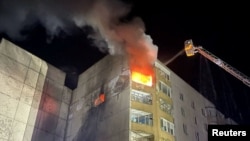 Russian drone attack hits central Ukraine apartment building