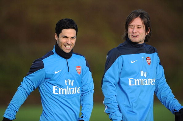 Tomas Rosicky responds to speculation he has an offer to rejoin Arsenal