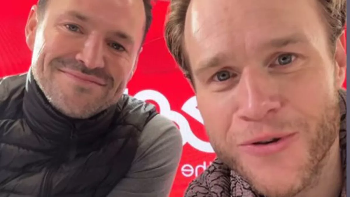 Olly Murs flashes his abs as he plugs breakfast radio show with Mark Wright