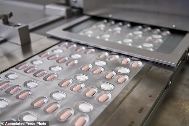 Britain FINALLY approves Pfizer's 'life-saving' Covid pill