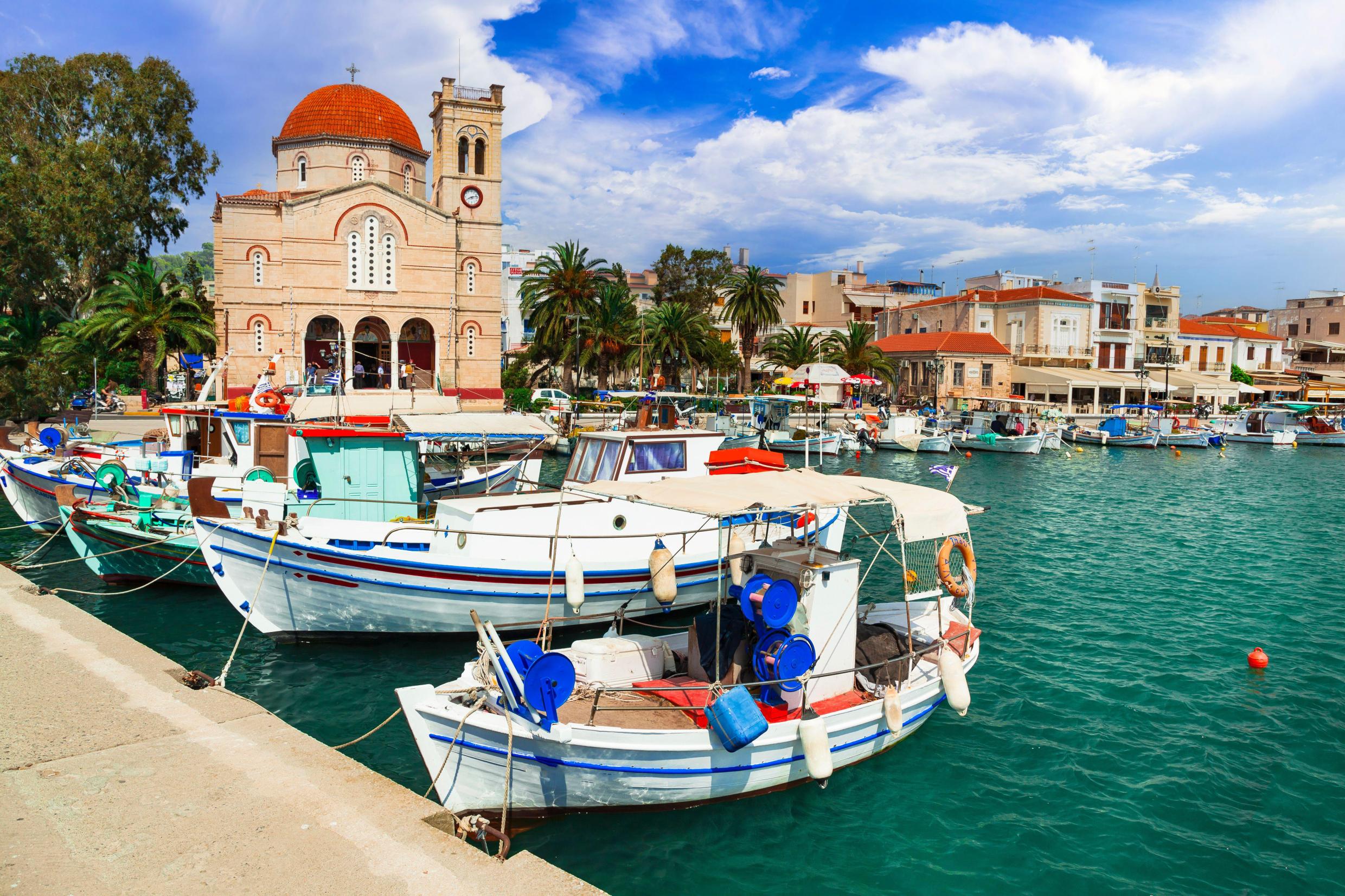 The pretty Greek island which is a picture-postcard vista & the perfect Athens add-on...