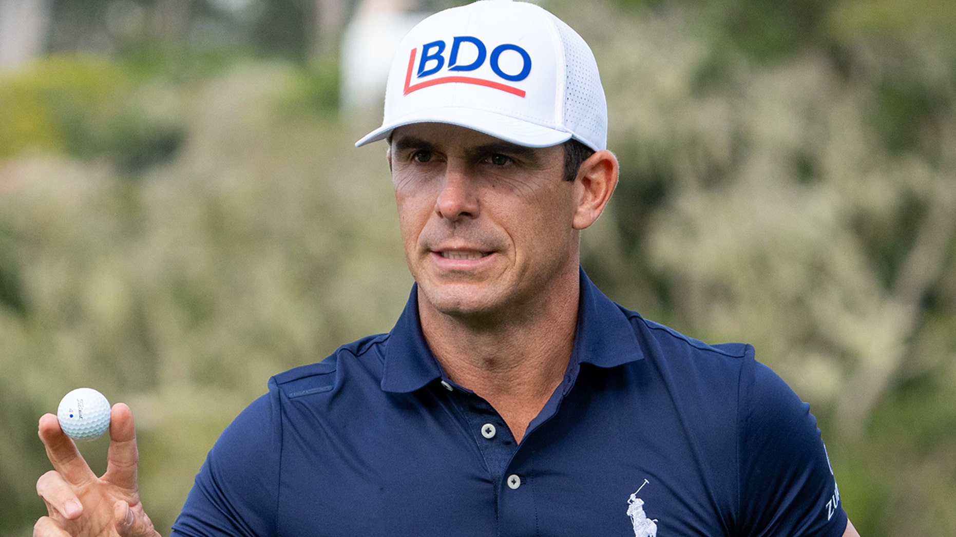 PGA Tour star Billy Horschel shoos gator off course with golf club in wild scene