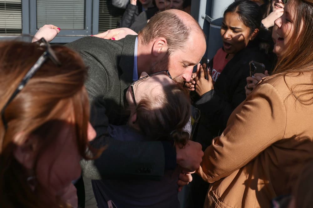 Prince of Wales gives ‘excited’ student a hug during visit to college