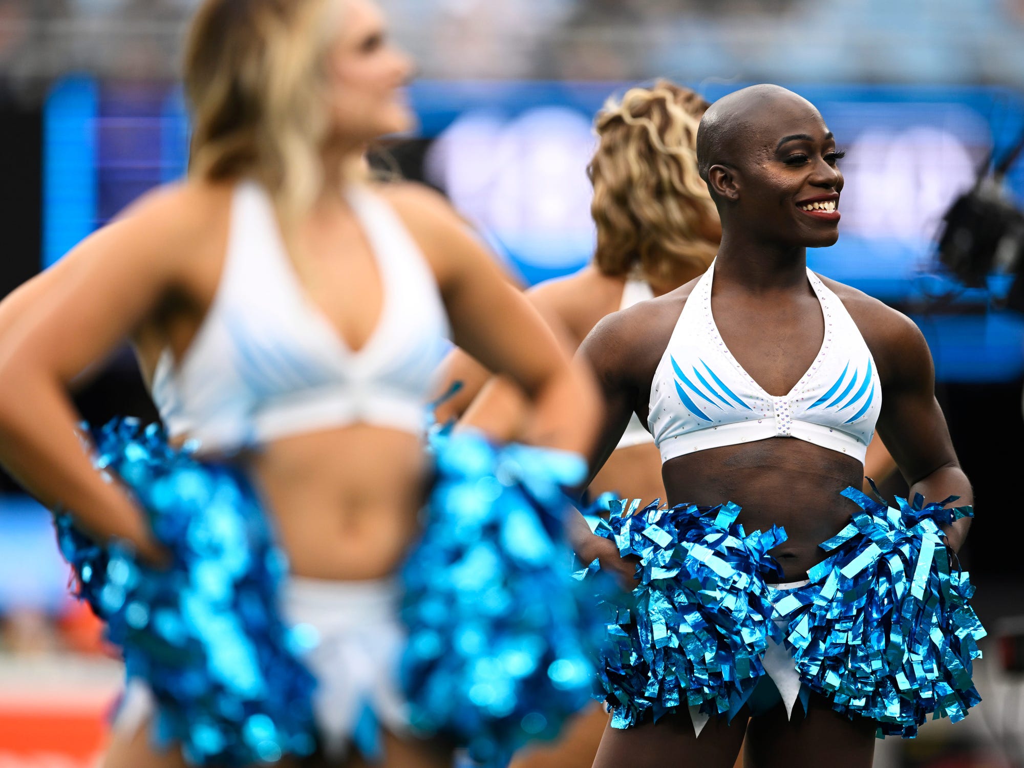 I'm the first openly transgender cheerleader in the NFL. Despite facing negative comments, I don't let anyone steal my joy.