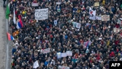 Serbia's striking students, president hold parallel rallies