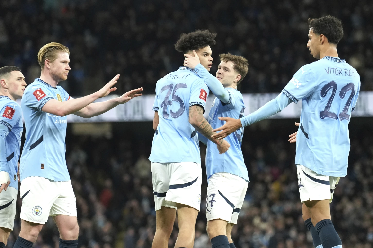 Man City gets past Plymouth to reach FA Cup quarters. Millwall keeper sent off for wild challenge