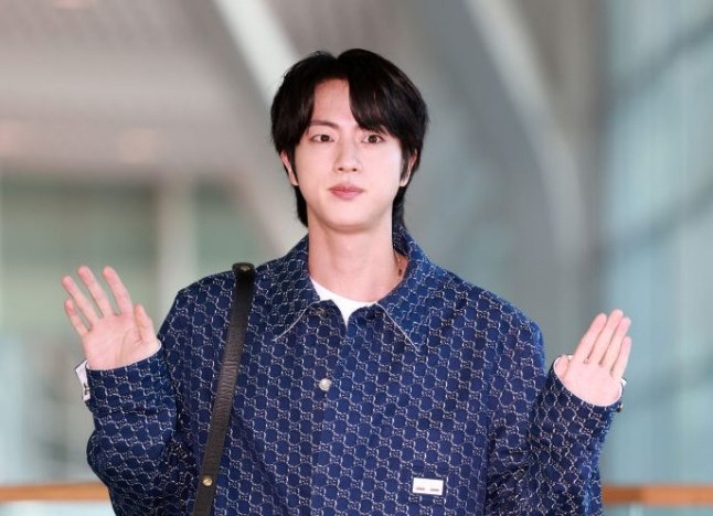 BTS fan under investigation after kissing Jin and declaring his 'skin was very soft'