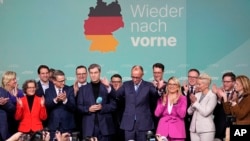 Germany's conservatives win election, hard coalition talks loom