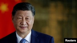 China's Xi holds rare meeting with business leaders amid slowing economy, US tensions