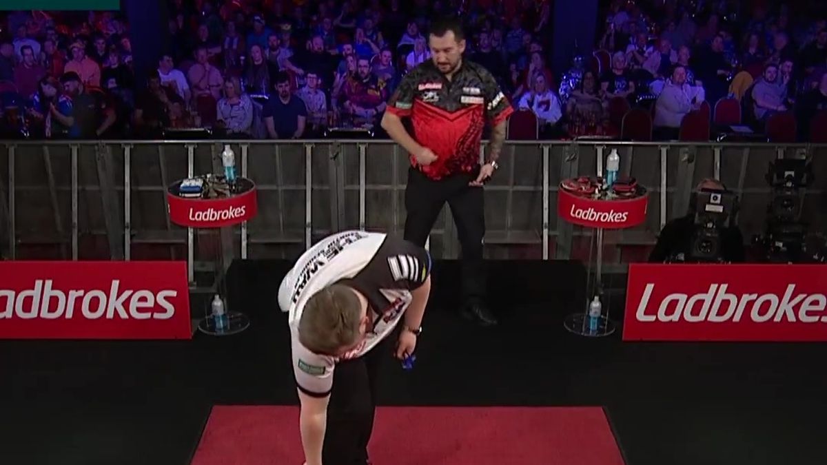 Darts star struck by his own arrow after freak rebound incident