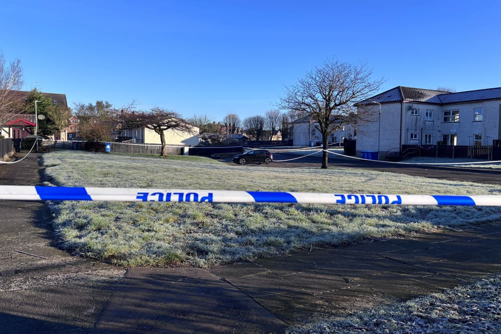 Murder victim in 70s found on floor of flat, police say