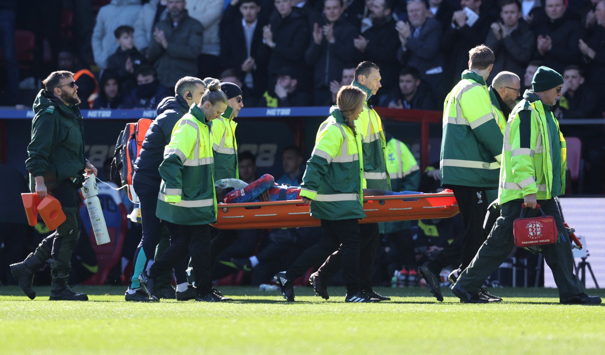 BBC commentator condemns Millwall fans’ vile chants as stricken Mateta is stretchered off and given o...