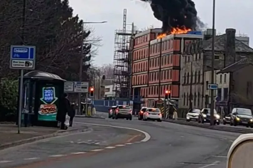 Huge fire engulfs UK block of flats as thick black smoke billows out into sky